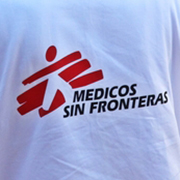 A member of staff wearing an MSF vest