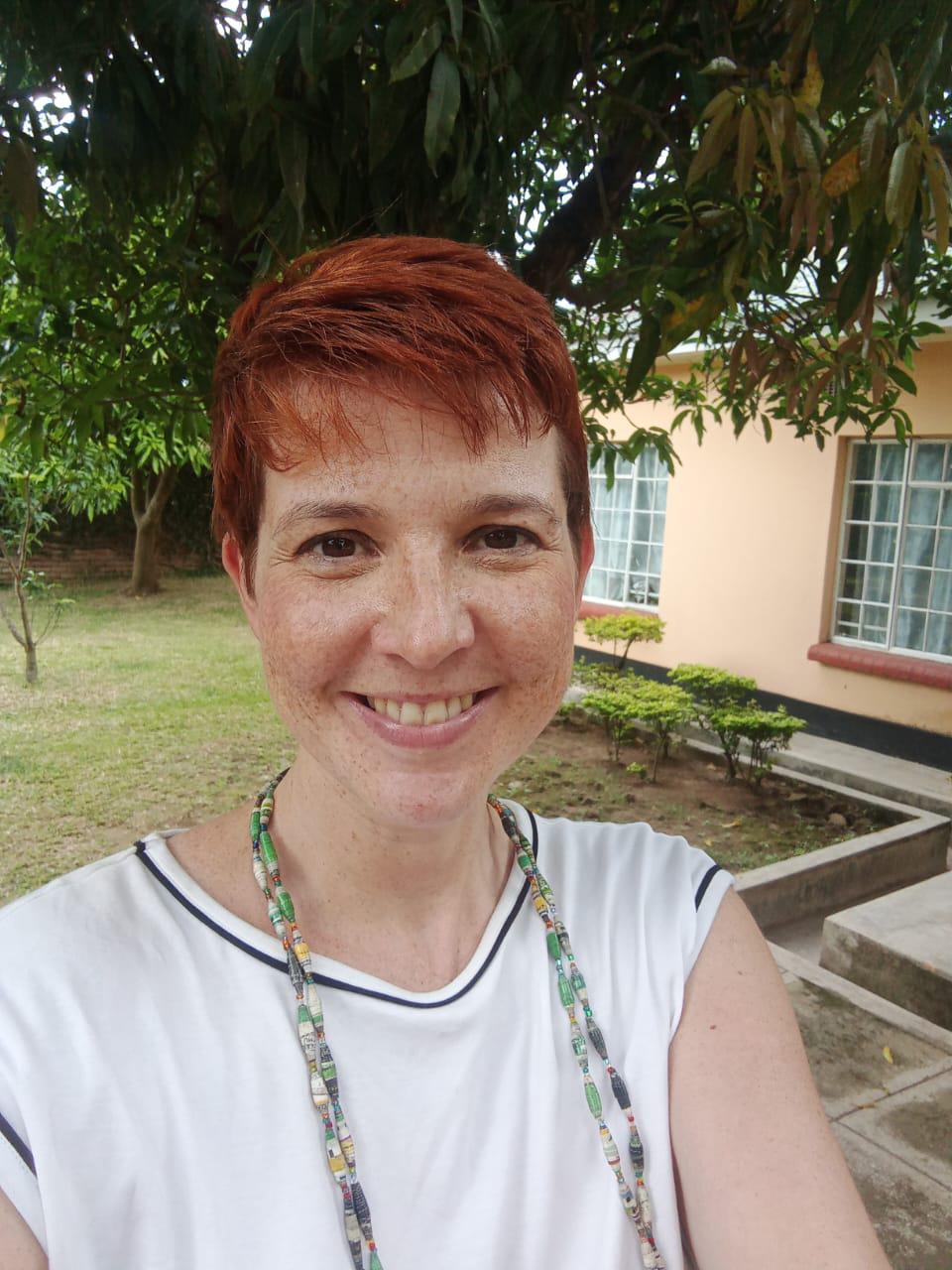 Photo of a woman with short red hair