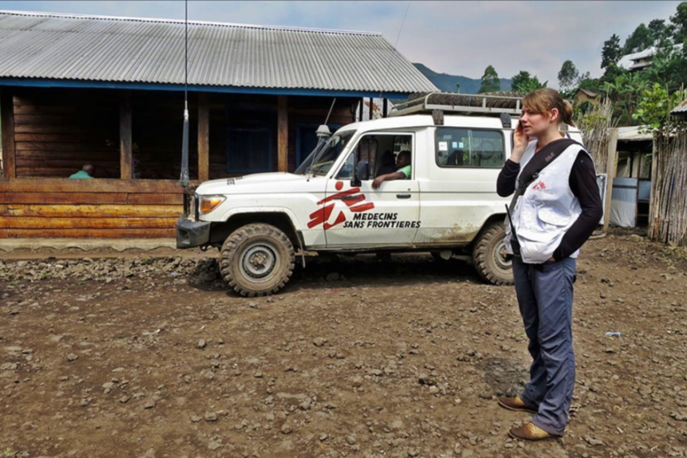 Emily and an MSF Land Cruiser in Mweso, Democratic Republic of Congo.